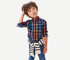 Child wearing Primary Long Sleeve Button Down - Rainbow Plaid - Navy / Rainbow Plaid. Available at www.tenlittle.com