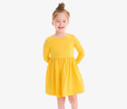 Child wearing Primary Long Sleeve Pocket Dress - Sunflower. Available at www.tenlittle.com