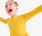 Child wearing Primary Long Sleeve Pocket Dress - Sunflower. Available at www.tenlittle.com