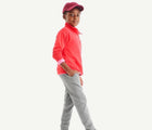 Boy wearing Primary French Terry Quarter Zip Sweatshirt - Strawberry. Available at www.tenlittle.com
