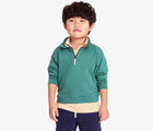 Boy wearing Primary French Terry Quarter Zip Sweatshirt - Sunwashed Teal. Available at www.tenlittle.com