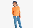 Boy wearing Primary French Terry Sweatpants - Moonlight. Available at www.tenlittle.com