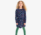 Child wearing Primary Sweatshirt Dress - Rainbow Stars - Navy / Confetti Stars. Available at www.tenlittle.com