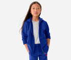 Child wearing Primary French Terry Zip Hoodie - Cobalt. Available at www.tenlittle.com