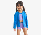 Child wearing Primary Long Sleeve Full-Zip Rash Guard - Blueberry. Available at www.tenlittle.com