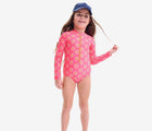 Girl wearing Primary Long Sleeve One-Piece Rash Guard - Bright Azalea / Cantaloupe. Available at www.tenlittle.com