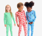 Kids wearing Primary - Long Sleeve PJ Set - Assorted Colors - Available at www.tenlittle.com