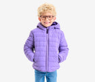 Boy wearing Primary - Reversible Fleece Puffer Jacket - Violet/Grape - Available at www.tenlittle.com