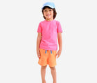 Child wearing Primary Swim Trunks in Cantaloupe - 2 Pack - Blueberry / Cantaloupe. Available at www.tenlittle.com