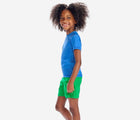 Child wearing Primary Swim Trunks in Green Apple - 2 Pack - Green Apple / Blueberry. Available at www.tenlittle.com