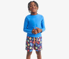 Child wearing Primary Swim Trunks - Under the Sea - Navy Under the Sea. Available at www.tenlittle.com