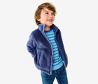 Child wearing Primary - Teddy Fleece Jacket - Sunwashed Navy - Available at www.tenlittle.com