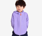 Boy wearing Primary - Windbreaker - Iris - Available at www.tenlittle.com