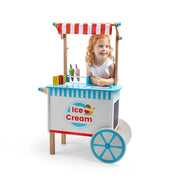 Girl standing in Bigjigs Wooden Ice Cream Cart. Available from www.tenlittle.com.