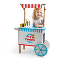 Girl standing in Bigjigs Wooden Ice Cream Cart. Available from www.tenlittle.com.