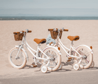 2 Banwood Classic Bike White at the beach. Available at www.tenlittle.com