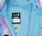 Close up of Therm Kids All-Weather Fleece Onesie - Electric Floral. Available from www.tenlittle.com.