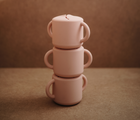 Piled Mushie snack cup in Blush - Available at www.tenlittle.com