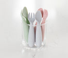 Ezpz Mini Utensils set of 2 inside of drinking glass in different colors- Available at www.tenlittle.com