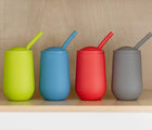 ezpz Happy Cup & Straw in blue and 3 other colors inside cabinet. Available at tenlittle.com