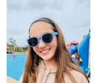 Child wearing Roshambo Round Sunglasses in Cloud blue. Available from tenlittle.com