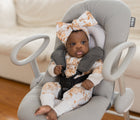 Child in Béaba Up & Down Height Adjustable Baby Rocker. Available from tenlittle.com