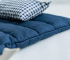 Close up image of Bloomere Portable Bedding Set - Navy Checkered - Available at www.tenlittle.com