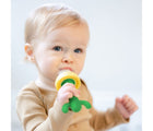 Child using Lollaland 2-in-1 Feeder & Teether. Available from tenlittle.com