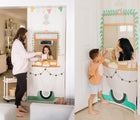 Children playing with Swingly Camper Food Truck Doorway Playhouse storefront. Available from tenlittle.com