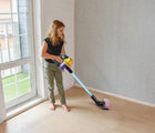 Girl playing with Nothing But Fun My First Vacuum Cleaner. Available from tenlittle.com