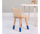 One chair from Nico & Yeye Kitty Chairs - Set of 2 in pacific blue in a playroom next to a table. Available from tenlittle.com