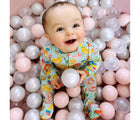 Baby playing in Little Big Playroom Ball Pit Set in classic blush. Available from tenlittle.com