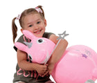 Girl hugging Kettler Rody Unicorn bounce toy