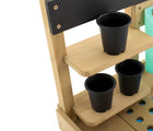 Close up view of pots in holding areas on TP Toys Wooden Potting Bench. Available from tenlittle.com