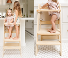 Two views of children standing on Piccalio Foldable Kitchen Tower in natural. Available from tenlittle.com