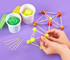 Child's hands playing with  Bright Stripes STEAM School Sculpture Science. Available from tenlittle.com