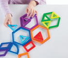 Child playing with Guidecraft Magnetic PowerClix Frames 48 Pieces. Available from tenlittle.com