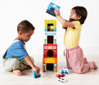 Two children playing with Ooly Stackable Toy & Car Set Busy City. Available from tenlittle.com