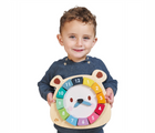 Child holding Tender Leaf Bear Clock. Available from tenlittle.com