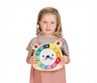 Child holding Tender Leaf Bear Clock. Available from tenlittle.com