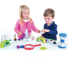 Girl and boy playing with Thames & Kosmos Science Laboratory. Available from tenlittle.com