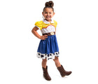 Child wearing Little Adventures Cowgirl Dress. Available from tenlittle.com