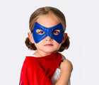 Child wearing blue side of mask from Little Adventures Hero Cape and Mask costume. Available from tenlittle.com