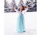 Child wearing Little Adventures Ice Princess Costume in the snow. Available from tenlittle.com