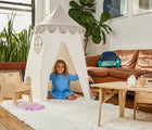 Child playing inside Domestic Objects Tower Tent in greige. Available from tenlittle.com