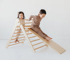 Two children playing on Climber Pikler Triangle Set. Available from tenlittle.com