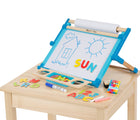 Melissa & Doug Double-Sided Tabletop Easel on a table. Available from tenlittle.com