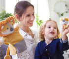 Woman and child playing with Haba Lion Puppet. Available from tenlittle.com