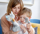Woman and child playing with Haba Rhino Puppet. Available from tenlittle.com