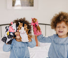 Two children playing with Melissa & Doug Farm Friends Hand Puppets. Available from tenlittle.com